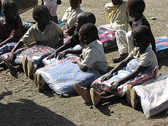 children with blankets