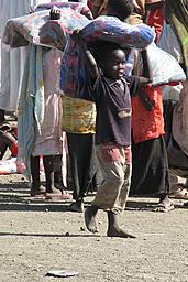 View larger image boy carrying blanket