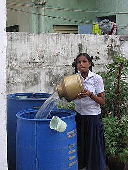 View larger image girl pouring water