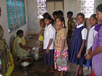 View larger image children receiving food